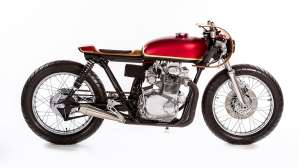 This Honda CB350 motorcycle has been beautifully customized with wood bodywork